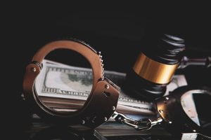 SGP Credit - Personal Loan With Low Interest Rate | Hammer and money in court.