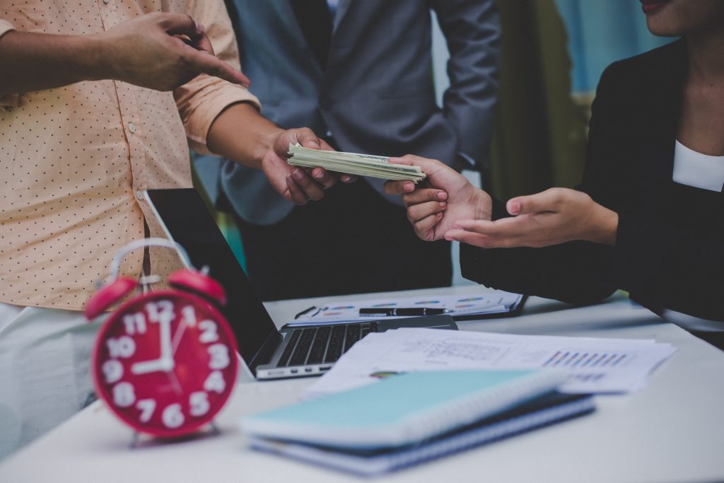 businessmen meeting and discussing about money