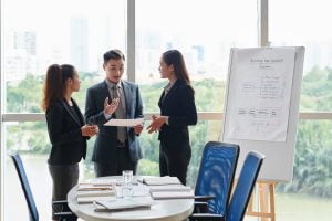 SGP Credit - Personal Loan With Low Interest Rate | Team Having Discussion in Boardroom